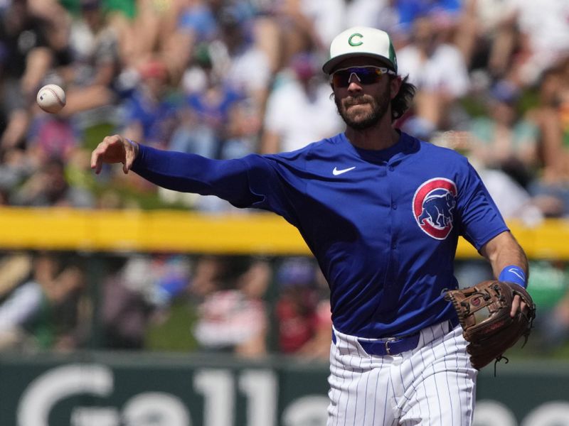 Mar 17, 2024; Mesa, Arizona, USA; Chicago Cubs shortstop Dansby Swanson (7) makes the play for an out against the Texas Rangers in the second inning at Sloan Park. Mandatory Credit: Rick Scuteri-USA TODAY Sports