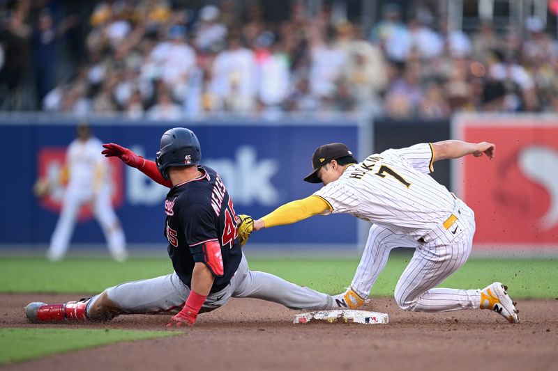 Jun 24, 2023; San Diego, California, USA; San Diego Padres second baseman Ha-seong Kim (7) tags out Washington Nationals designated hitter Joey Meneses (45) at second base during the sixth inning at Petco Park. Mandatory Credit: Orlando Ramirez-USA TODAY Sports