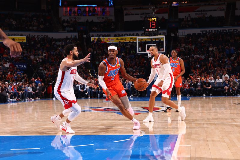 OKLAHOMA CITY, OK - FEBRUARY 27: Shai Gilgeous-Alexander #2 of the Oklahoma City Thunder drives to the basket during the game against the Houston Rockets on February, 2024 at Paycom Arena in Oklahoma City, Oklahoma. NOTE TO USER: User expressly acknowledges and agrees that, by downloading and or using this photograph, User is consenting to the terms and conditions of the Getty Images License Agreement. Mandatory Copyright Notice: Copyright 2024 NBAE (Photo by Zach Beeker/NBAE via Getty Images)