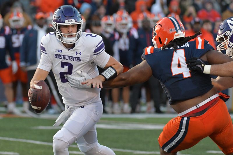 Nov 25, 2023; Champaign, Illinois, USA; Illinois Fighting Illini defensive tackle Jer'Zhan Newton (4) sacks Northwestern Wildcats quarterback Ben Bryant (2) during the first half at Memorial Stadium. Mandatory Credit: Ron Johnson-USA TODAY Sports