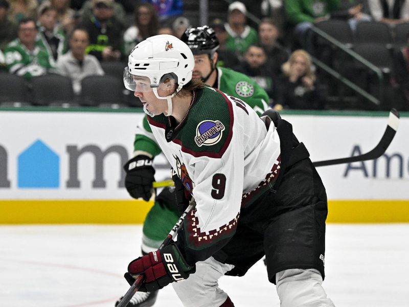 Nov 14, 2023; Dallas, Texas, USA; Arizona Coyotes right wing Clayton Keller (9) skates against the Dallas Stars during the first period at the American Airlines Center. Mandatory Credit: Jerome Miron-USA TODAY Sports