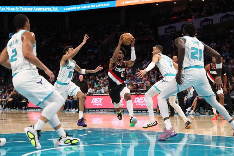 CHARLOTTE, NC - APRIL 3:  Scoot Henderson #00 of the Portland Trail Blazers drives to the basket during the game against the Charlotte Hornets on April 3, 2024 at Spectrum Center in Charlotte, North Carolina. NOTE TO USER: User expressly acknowledges and agrees that, by downloading and or using this photograph, User is consenting to the terms and conditions of the Getty Images License Agreement.  Mandatory Copyright Notice:  Copyright 2024 NBAE (Photo by Brock Williams-Smith/NBAE via Getty Images)