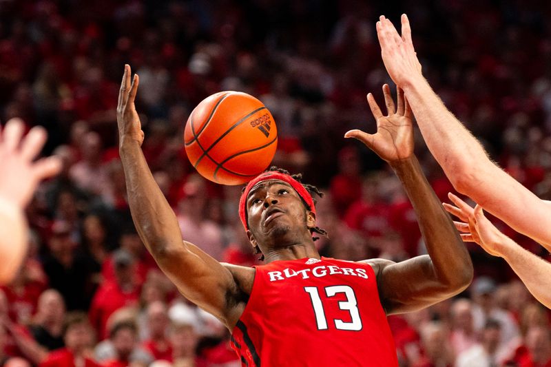 Mar 3, 2024; Lincoln, Nebraska, USA; Rutgers Scarlet Knights forward Antwone Woolfolk (13) watches the ball against the Nebraska Cornhuskers during the second half at Pinnacle Bank Arena. Mandatory Credit: Dylan Widger-USA TODAY Sports