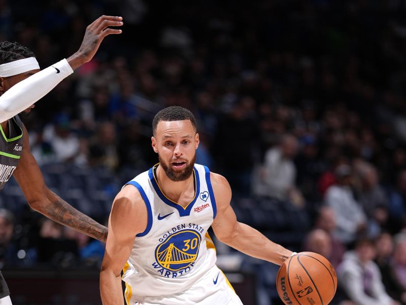 MINNEAPOLIS, MN -  MARCH 24: Stephen Curry #30 of the Golden State Warriors dribbles the ball during the game against the Minnesota Timberwolves on March 24, 2024 at Target Center in Minneapolis, Minnesota. NOTE TO USER: User expressly acknowledges and agrees that, by downloading and or using this Photograph, user is consenting to the terms and conditions of the Getty Images License Agreement. Mandatory Copyright Notice: Copyright 2024 NBAE (Photo by Jordan Johnson/NBAE via Getty Images)