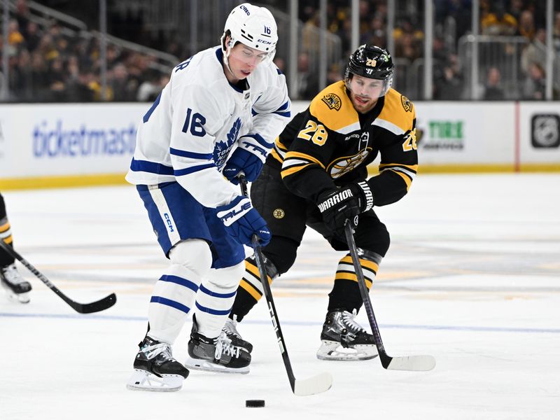 Feb 25, 2025; Boston, Massachusetts, USA; Toronto Maple Leafs right wing Mitch Marner (16) skates against Boston Bruins center Elias Lindholm (28) during the first period at the TD Garden. Mandatory Credit: Brian Fluharty-Imagn Images