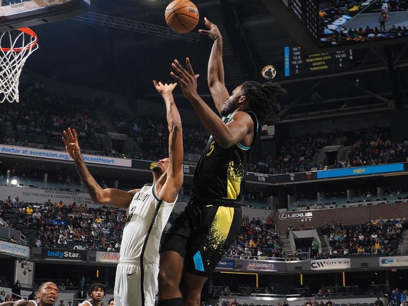 INDIANAPOLIS, IN - MARCH 16: Jarace Walker #5 of the Indiana Pacers shoots the ball during the game against the Brooklyn Nets on March 16, 2024 at Gainbridge Fieldhouse in Indianapolis, Indiana. NOTE TO USER: User expressly acknowledges and agrees that, by downloading and or using this Photograph, user is consenting to the terms and conditions of the Getty Images License Agreement. Mandatory Copyright Notice: Copyright 2024 NBAE (Photo by Ron Hoskins/NBAE via Getty Images)