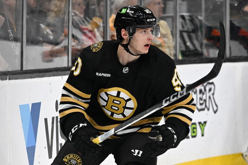 Feb 10, 2024; Boston, Massachusetts, USA; Boston Bruins center Anthony Richard (90) skates against the Washington Capitals during the third period at the TD Garden. Mandatory Credit: Brian Fluharty-USA TODAY Sports