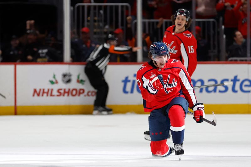 Nov 22, 2023; Washington, District of Columbia, USA; Washington Capitals center Dylan Strome (17) celebrates after scoring the game winning goal in overtime against the Buffalo Sabres at Capital One Arena. Mandatory Credit: Geoff Burke-USA TODAY Sports