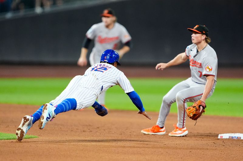 Aug 19, 2024; New York City, New York, USA; New York Mets shortstop Francisco Lindor (12) steals second base as Baltimore Orioles second baseman Jackson Holiday (7) awaits the throw during the fifth inning at Citi Field. Mandatory Credit: Gregory Fisher-USA TODAY Sports