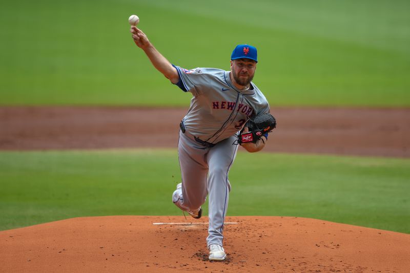 Sep 30, 2024; Atlanta, Georgia, USA; New York Mets starting pitcher Tylor Megill (38) throws against the Atlanta Braves in the first inning at Truist Park. Mandatory Credit: Brett Davis-Imagn Images