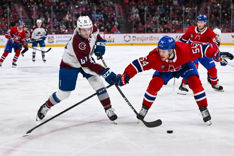 Jan 15, 2024; Montreal, Quebec, CAN; Montreal Canadiens defenseman Jordan Harris (54) defends the puck against Colorado Avalanche right wing Jason Polin (41) during the second period at Bell Centre. Mandatory Credit: David Kirouac-USA TODAY Sports