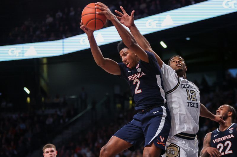 Jan 20, 2024; Atlanta, Georgia, USA; Virginia Cavaliers guard Reece Beekman (2) grabs a rebound past Georgia Tech Yellow Jackets forward Tyzhaun Claude (12) in the second half at McCamish Pavilion. Mandatory Credit: Brett Davis-USA TODAY Sports