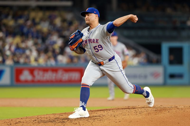 Apr 19, 2024; Los Angeles, California, USA;  New York Mets pitcher Sean Manaea (59) pitches during the fourth inning against the Los Angeles Dodgers at Dodger Stadium. Mandatory Credit: Kiyoshi Mio-USA TODAY Sports