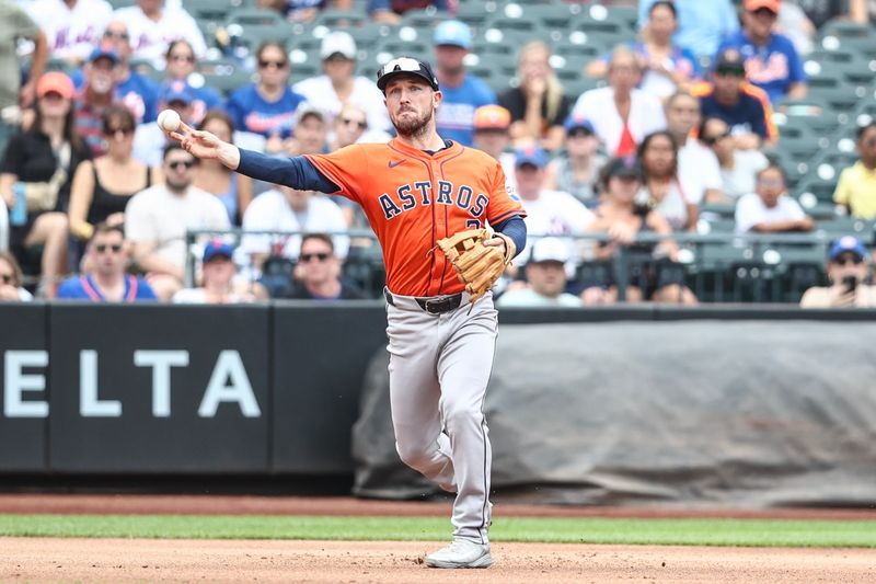 Jun 30, 2024; New York City, New York, USA;  Houston Astros third baseman Alex Bregman (2) throws a runner out at first base in the first inning against the New York Mets at Citi Field. Mandatory Credit: Wendell Cruz-USA TODAY Sports