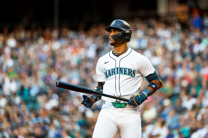 Jul 2, 2024; Seattle, Washington, USA; Seattle Mariners center fielder Julio Rodriguez (44) reacts after striking out against the Baltimore Orioles during the fifth inning at T-Mobile Park. Mandatory Credit: Joe Nicholson-USA TODAY Sports