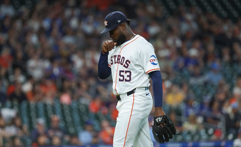 Apr 3, 2024; Houston, Texas, USA; Houston Astros starting pitcher Cristian Javier (53) walks off the field after pitching during the first inning against the Toronto Blue Jays at Minute Maid Park. Mandatory Credit: Troy Taormina-USA TODAY Sports
