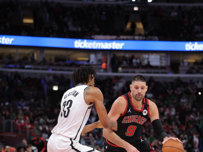 CHICAGO, IL - MARCH 13: Nikola Vucevic #9 of the Chicago Bulls handles the ball during the game against the Brooklyn Nets on March 13, 2025 at United Center in Chicago, Illinois. NOTE TO USER: User expressly acknowledges and agrees that, by downloading and or using this photograph, User is consenting to the terms and conditions of the Getty Images License Agreement. Mandatory Copyright Notice: Copyright 2025 NBAE  (Photo by Melissa Tamez/NBAE via Getty Images)