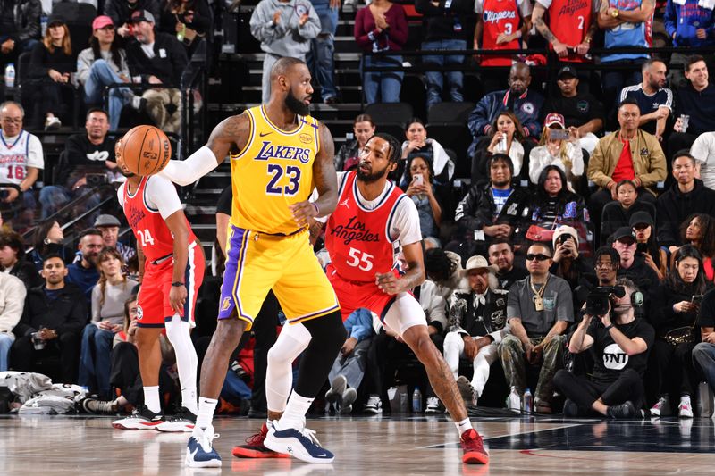 INGLEWOOD, CA - FEBRUARY 4: LeBron James #23 of the Los Angeles Lakers handles the ball during the game against the LA Clippers on February 4, 2025 at Intuit Dome in Los Angeles, California. NOTE TO USER: User expressly acknowledges and agrees that, by downloading and/or using this Photograph, user is consenting to the terms and conditions of the Getty Images License Agreement. Mandatory Copyright Notice: Copyright 2025 NBAE (Photo by Juan Ocampo/NBAE via Getty Images)