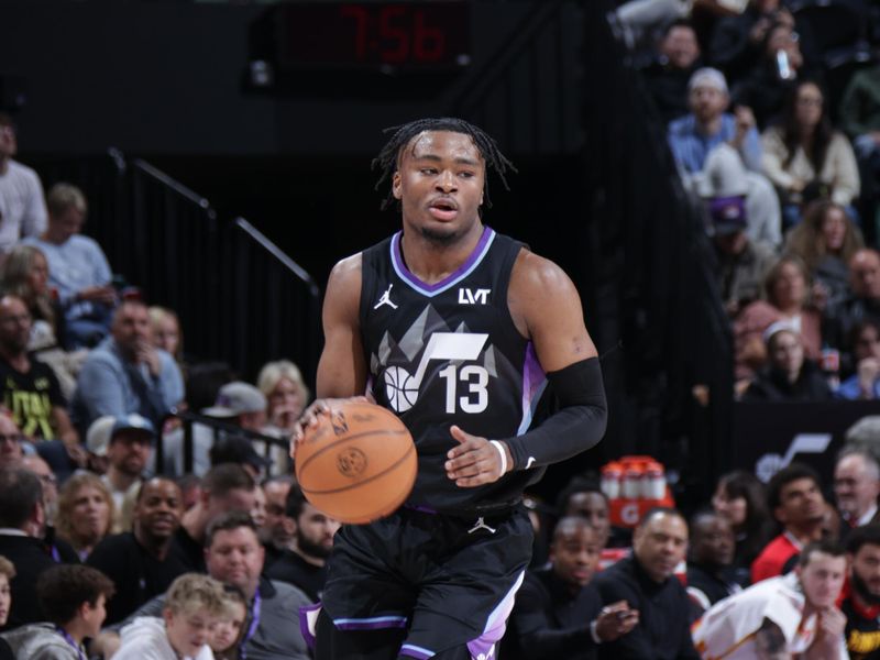 SALT LAKE CITY, UT - JANUARY 7: Isaiah Collier #13 of the Utah Jazz dribbles the ball during the game against the Atlanta Hawks on January 7, 2025 at Delta Center in Salt Lake City, Utah. NOTE TO USER: User expressly acknowledges and agrees that, by downloading and or using this Photograph, User is consenting to the terms and conditions of the Getty Images License Agreement. Mandatory Copyright Notice: Copyright 2025 NBAE (Photo by Melissa Majchrzak/NBAE via Getty Images)