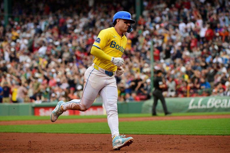 Jun 28, 2025; Boston, Massachusetts, USA; Toronto Blue Jays relief pitcher Jeff Hoffman (23) rounds the bases after hitting a two run home run during the seventh inning against the Toronto Blue Jays at Fenway Park. Mandatory Credit: Bob DeChiara-Imagn Images