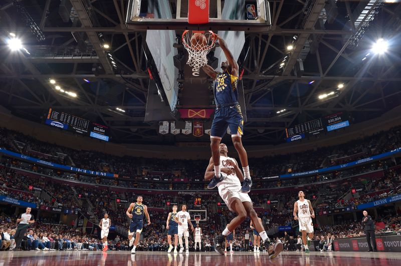 CLEVELAND, OH - APRIL 13:  Quenton Jackson #29 of the Indiana Pacers dunks the ball during the game against the Cleveland Cavaliers on April 13, 2025 at Rocket Arena in Cleveland, Ohio. NOTE TO USER: User expressly acknowledges and agrees that, by downloading and/or using this Photograph, user is consenting to the terms and conditions of the Getty Images License Agreement. Mandatory Copyright Notice: Copyright 2025 NBAE (Photo by David Liam Kyle/NBAE via Getty Images)