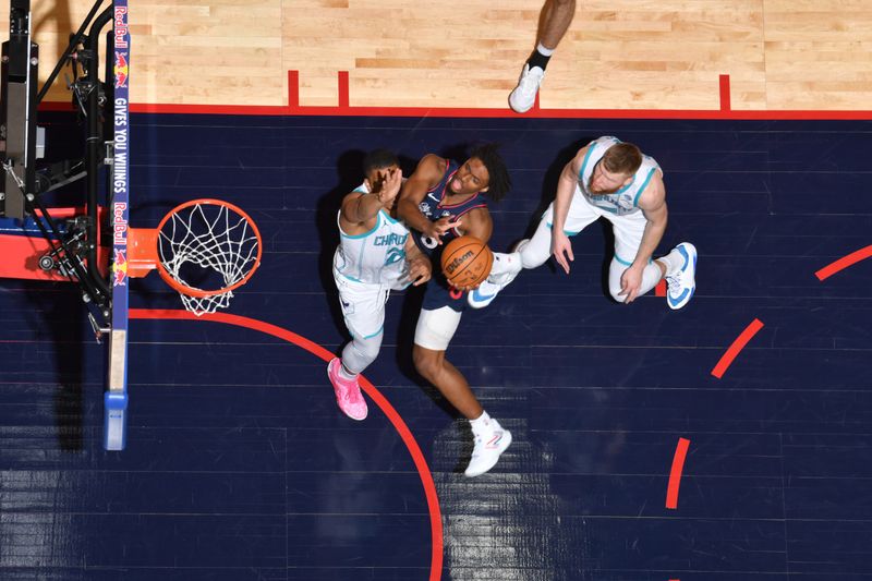 PHILADELPHIA, PA - MARCH 16: Tyrese Maxey #0 of the Philadelphia 76ers drives to the basket during the game against the Charlotte Hornets on March 16, 2024 at the Wells Fargo Center in Philadelphia, Pennsylvania NOTE TO USER: User expressly acknowledges and agrees that, by downloading and/or using this Photograph, user is consenting to the terms and conditions of the Getty Images License Agreement. Mandatory Copyright Notice: Copyright 2024 NBAE (Photo by Jesse D. Garrabrant/NBAE via Getty Images)