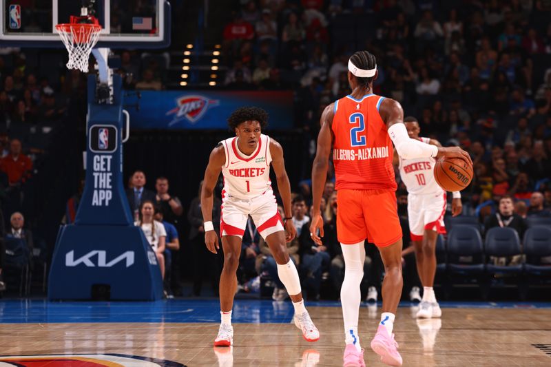 OKLAHOMA CITY, OK - FEBRUARY 27: Amen Thompson #1 of the Houston Rockets plays defense during the game against the Oklahoma City Thunder on February, 2024 at Paycom Arena in Oklahoma City, Oklahoma. NOTE TO USER: User expressly acknowledges and agrees that, by downloading and or using this photograph, User is consenting to the terms and conditions of the Getty Images License Agreement. Mandatory Copyright Notice: Copyright 2024 NBAE (Photo by Zach Beeker/NBAE via Getty Images)