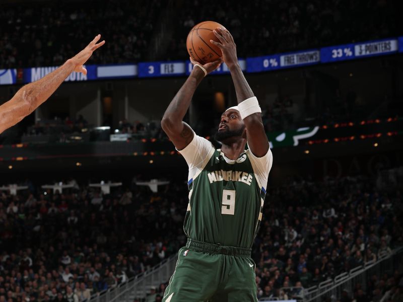 MILWAUKEE, WI - FEBRUARY 8: Bobby Portis #9 of the Milwaukee Bucks shoots the ball during the game against the Minnesota Timberwolves on February 8, 2024 at the Fiserv Forum Center in Milwaukee, Wisconsin. NOTE TO USER: User expressly acknowledges and agrees that, by downloading and or using this Photograph, user is consenting to the terms and conditions of the Getty Images License Agreement. Mandatory Copyright Notice: Copyright 2024 NBAE (Photo by Gary Dineen/NBAE via Getty Images).