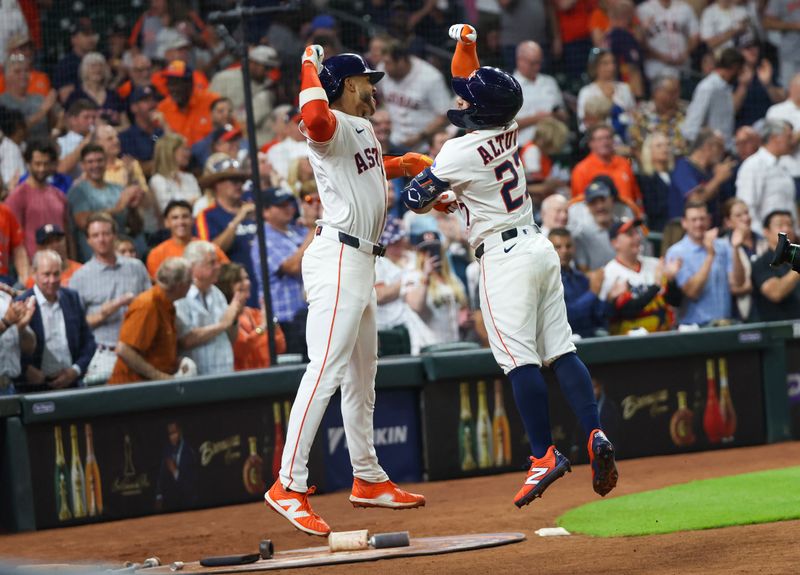 May 27, 2025; Houston, Texas, USA;Houston Astros shortstop Jeremy Pena (3) celebrates designated hitter Jose Altuve (27) home run against the Athletics in the fourth inning at Daikin Park. Mandatory Credit: Thomas Shea-Imagn Images