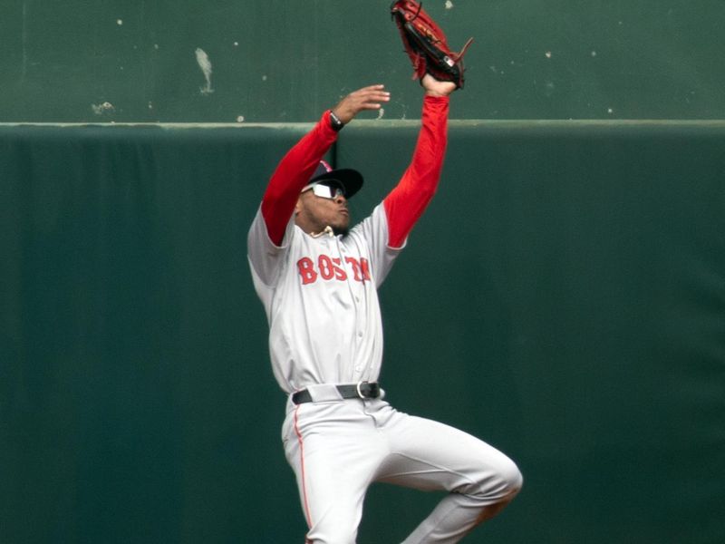 Apr 3, 2024; Oakland, California, USA; Boston Red Sox center fielder Ceddanne Rafaela (43) makes a leaping catch of a deep drive by Oakland Athletics designated hitter Brent Rooker during the fourth inning at Oakland-Alameda County Coliseum. Mandatory Credit: D. Ross Cameron-USA TODAY Sports