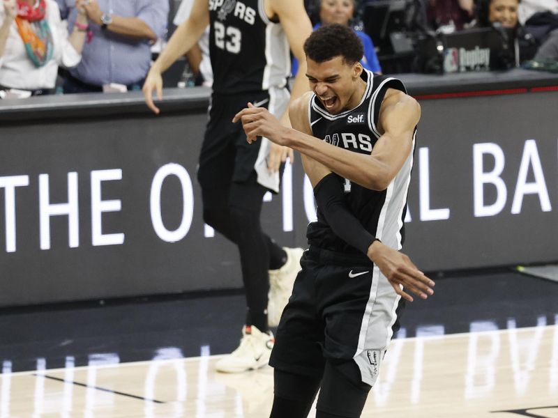 SAN ANTONIO, TX - APRIL 12: Victor Wembanyama #1 of the San Antonio Spurs celebrates after they defeated the Denver Nuggets 121-120 at Frost Bank Center on April 12, 2024 in San Antonio, Texas. NOTE TO USER: User expressly acknowledges and agrees that, by downloading and or using this photograph, User is consenting to terms and conditions of the Getty Images License Agreement. (Photo by Ronald Cortes/Getty Images)