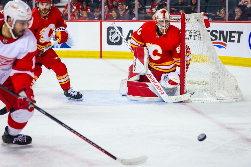 Feb 17, 2024; Calgary, Alberta, CAN; Calgary Flames goaltender Dan Vladar (80) guards his net against the Detroit Red Wings during the second period at Scotiabank Saddledome. Mandatory Credit: Sergei Belski-USA TODAY Sports