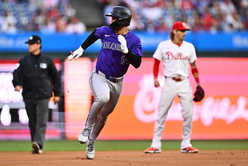 Apr 17, 2024; Philadelphia, Pennsylvania, USA; Colorado Rockies shortstop Ezequiel Tovar (14) advances to third against the Philadelphia Phillies in the first inning at Citizens Bank Park. Mandatory Credit: Kyle Ross-USA TODAY Sports