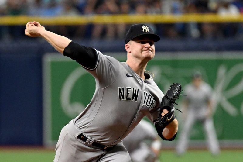 Aug 26, 2023; St. Petersburg, Florida, USA; New York Yankees Clarke Schmidt (36) pitcher throws a pitch against the Tampa Bay Rays in the first inning at Tropicana Field. Mandatory Credit: Jonathan Dyer-USA TODAY Sports