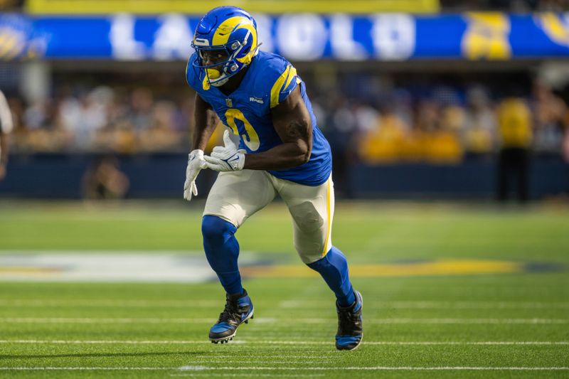 Los Angeles Rams linebacker Byron Young (0) runs during an NFL football game against the Pittsburgh Steelers, Sunday, Oct. 22, 2023, in Inglewood, Calif. (AP Photo/Kyusung Gong)