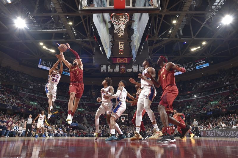 CLEVELAND, OH - FEBRUARY 12: Max Strus #1 of the Cleveland Cavaliers grabs the rebound during the game against the Philadelphia 76ers on February 12, 2024 at Rocket Mortgage FieldHouse in Cleveland, Ohio. NOTE TO USER: User expressly acknowledges and agrees that, by downloading and/or using this Photograph, user is consenting to the terms and conditions of the Getty Images License Agreement. Mandatory Copyright Notice: Copyright 2024 NBAE (Photo by David Liam Kyle/NBAE via Getty Images)