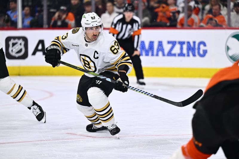 Jan 27, 2024; Philadelphia, Pennsylvania, USA; Boston Bruins left wing Brad Marchand (63) in action against the Philadelphia Flyers in the second period at Wells Fargo Center. Mandatory Credit: Kyle Ross-USA TODAY Sports