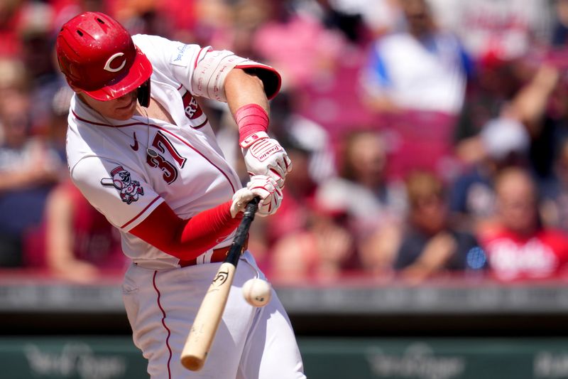 Jun 25, 2023; Cincinnati, Ohio, USA; Cincinnati Reds catcher Tyler Stephenson (37) hits a single in the fourth inning of a baseball game against the Atlanta Braves at Great American Ball Park. The Atlanta Braves won, 7-6. Mandatory Credit: Kareem Elgazzar-USA TODAY Sports