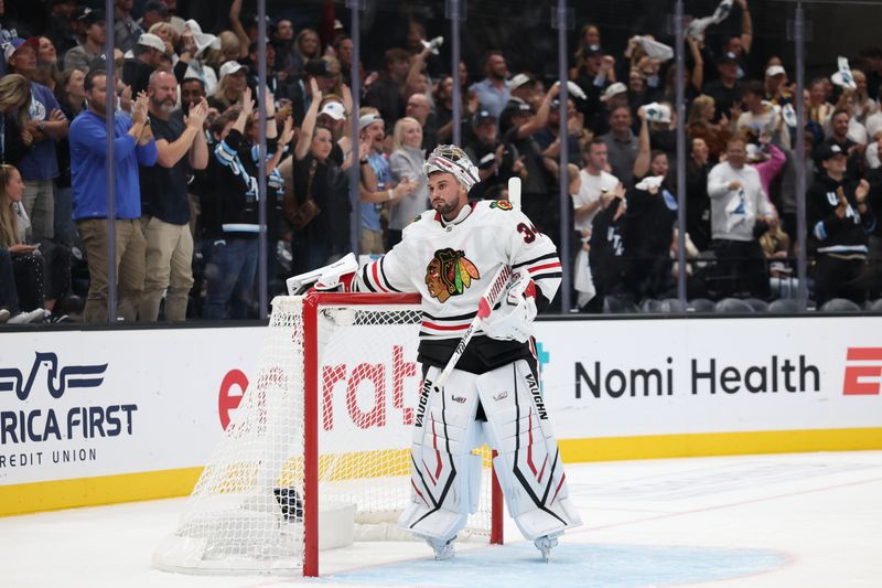 Oct 8, 2024; Salt Lake City, Utah, USA; Chicago Blackhawks goaltender Petr Mrazek (34) reacts to a goal by the Utah Hockey Club during the second period at Delta Center. Mandatory Credit: Rob Gray-Imagn Images