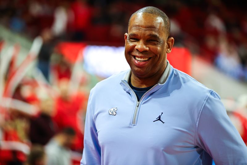 Feb 19, 2023; Raleigh, North Carolina, USA; North Carolina Tar Heels head coach Hubert Davis reacts before the first half of the game against North Carolina State Wolfpack at PNC Arena. Mandatory Credit: Jaylynn Nash-USA TODAY Sports