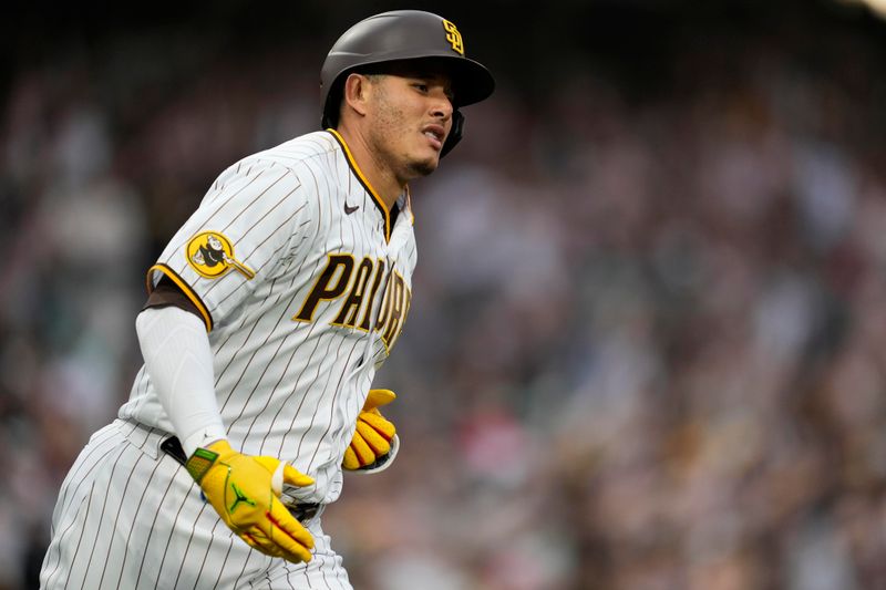 Jun 14, 2023; San Diego, California, USA;  San Diego Padres third baseman Manny Machado (13) runs the bases after hitting a home run against the Cleveland Guardians during the third inning at Petco Park. Mandatory Credit: Ray Acevedo-USA TODAY Sports