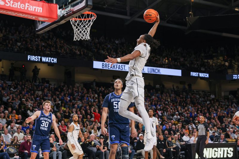 Jan 13, 2024; Orlando, Florida, USA; UCF Knights guard Shemarri Allen (2) goes to the basket during the second half against the Brigham Young Cougars at Addition Financial Arena. Mandatory Credit: Mike Watters-USA TODAY Sports