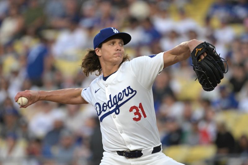 Jul 24, 2024; Los Angeles, California, USA;  Los Angeles Dodgers starting pitcher Tyler Glasnow (31) delivers to the plate in the first inning against the Los Angeles Dodgers at Dodger Stadium. Mandatory Credit: Jayne Kamin-Oncea-USA TODAY Sports