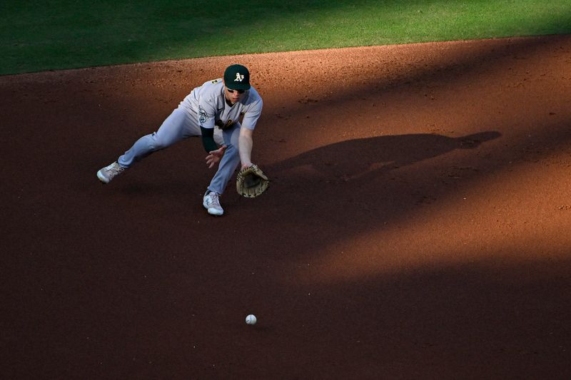 Aug 16, 2023; St. Louis, Missouri, USA;  Oakland Athletics shortstop Nick Allen (2) fields a ground ball against the St. Louis Cardinals during the first inning at Busch Stadium. Mandatory Credit: Jeff Curry-USA TODAY Sports