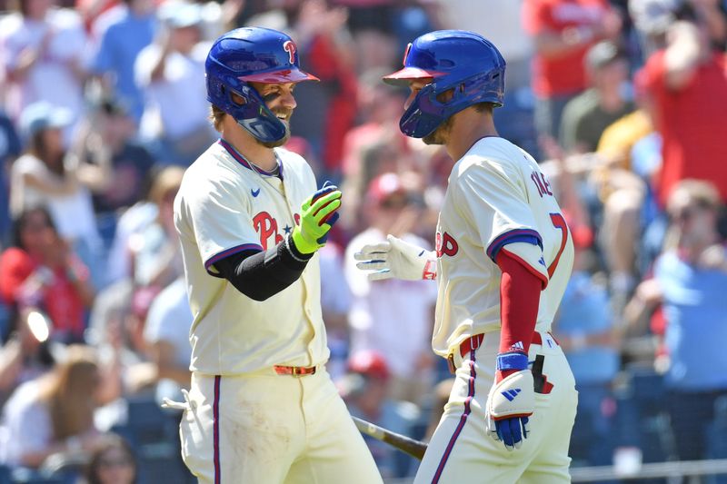 Apr 14, 2024; Philadelphia, Pennsylvania, USA; Philadelphia Phillies shortstop Trea Turner (7) celebrates his home run with first base Bryce Harper (3) against the Pittsburgh Pirates at Citizens Bank Park. Mandatory Credit: Eric Hartline-USA TODAY Sports