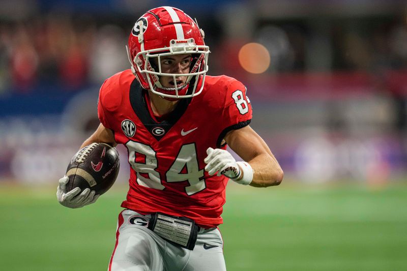 Sep 3, 2022; Atlanta, Georgia, USA; Georgia Bulldogs wide receiver Ladd McConkey (84) runs against the Oregon Ducks during the first quarter at Mercedes-Benz Stadium. Mandatory Credit: Dale Zanine-USA TODAY Sports