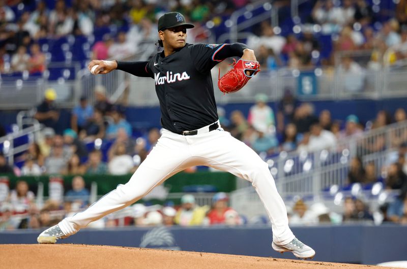 Aug 9, 2024; Miami, Florida, USA;  Miami Marlins starting pitcher Edward Cabrera (27) delivers a pitch against the San Diego Padres in the first inning at loanDepot Park. Mandatory Credit: Rhona Wise-USA TODAY Sports