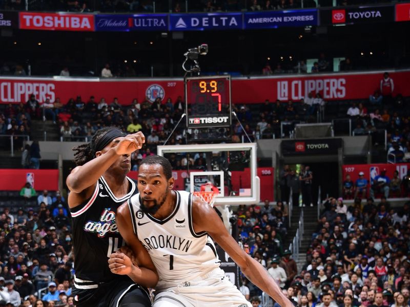 LOS ANGELES, CA - NOVEMBER 12: Kevin Durant #7 of the Brooklyn Nets dribbles the ball during the game against the LA Clippers on November 12, 2022 at Crypto.com Arena in Los Angeles, California. NOTE TO USER: User expressly acknowledges and agrees that, by downloading and/or using this Photograph, user is consenting to the terms and conditions of the Getty Images License Agreement. Mandatory Copyright Notice: Copyright 2022 NBAE (Photo by Adam Pantozzi/NBAE via Getty Images)