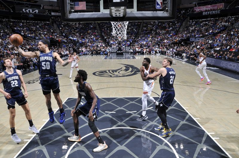 ORLANDO, FL - JANUARY 28: Cole Anthony #50 of the Orlando Magic grabs the rebound during the game on January 28, 2024 at Amway Center in Orlando, Florida. NOTE TO USER: User expressly acknowledges and agrees that, by downloading and or using this photograph, User is consenting to the terms and conditions of the Getty Images License Agreement. Mandatory Copyright Notice: Copyright 2024 NBAE (Photo by Fernando Medina/NBAE via Getty Images)