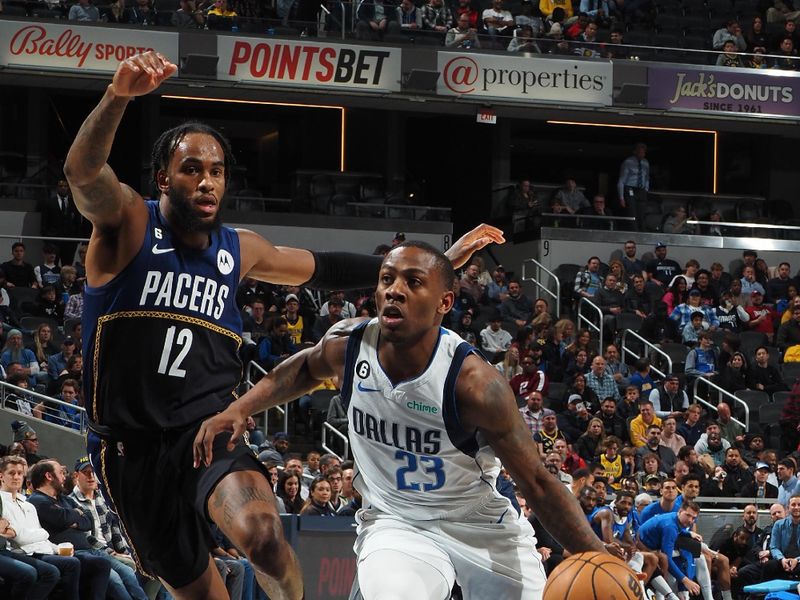 INDIANAPOLIS, IN - MARCH 27: McKinley Wright IV #23 of the Dallas Mavericks dribbles the ball during the game against the Indiana Pacers on March 27, 2023 at Gainbridge Fieldhouse in Indianapolis, Indiana. NOTE TO USER: User expressly acknowledges and agrees that, by downloading and or using this Photograph, user is consenting to the terms and conditions of the Getty Images License Agreement. Mandatory Copyright Notice: Copyright 2023 NBAE (Photo by Ron Hoskins/NBAE via Getty Images)